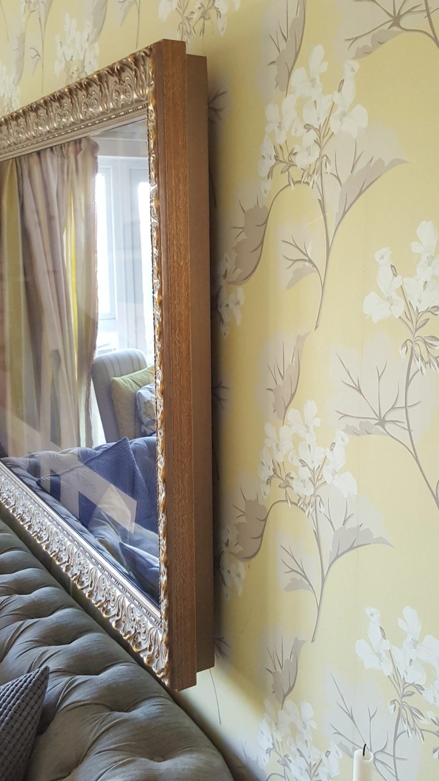 Ornate Gold Living Room Mirror TV — standard wall — detail photograph