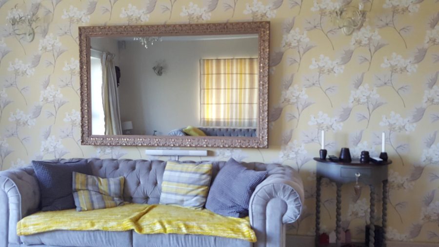 Ornate Gold Living Room Mirror TV — standard wall — detail photograph