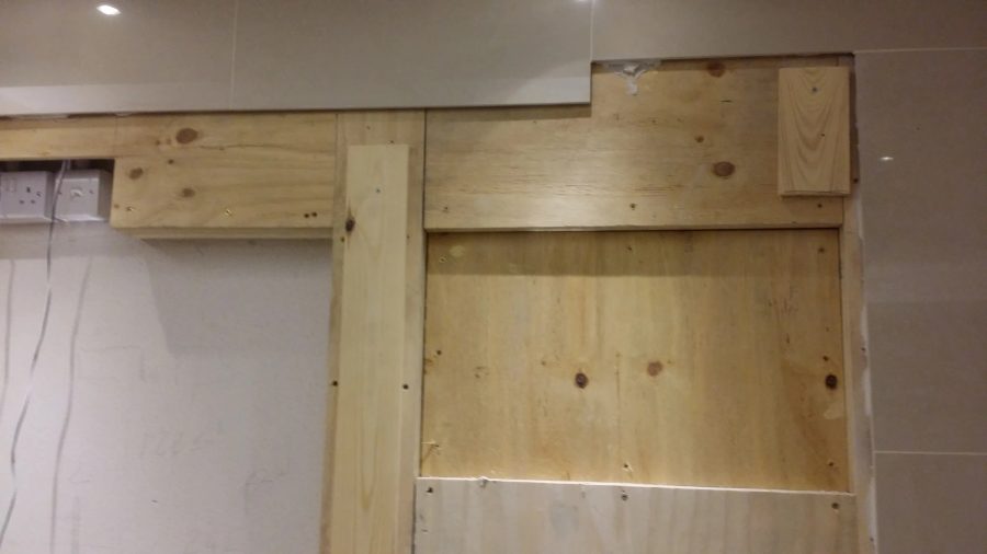 Bespoke Changing Room Mirror TV Wall — detail photograph