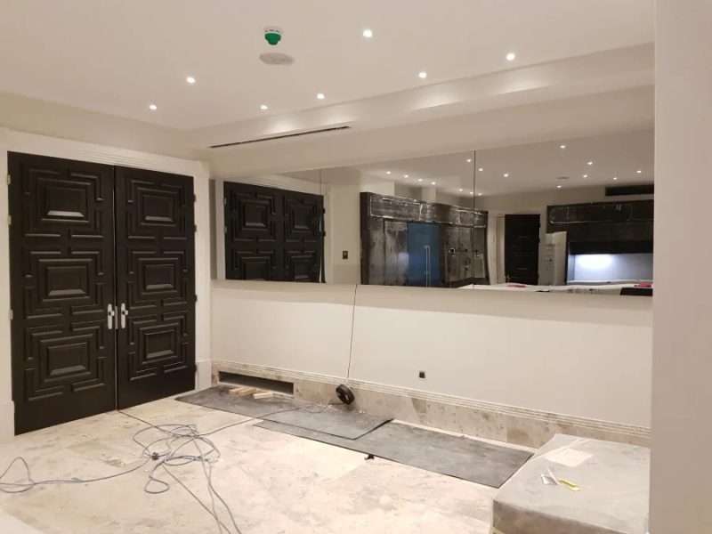 Full-Width Kitchen Mirror TV Wall