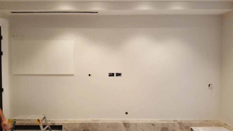 Full-Width Kitchen Mirror TV Wall — detail photograph