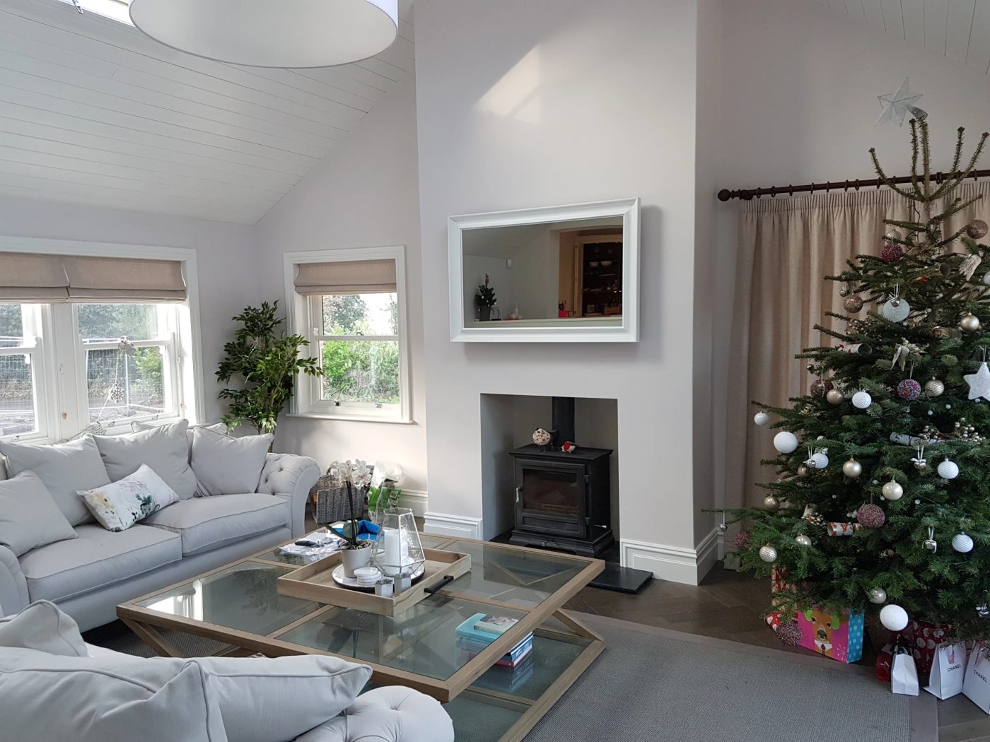 Ivory Fireplace Mirror TV — above fireplace