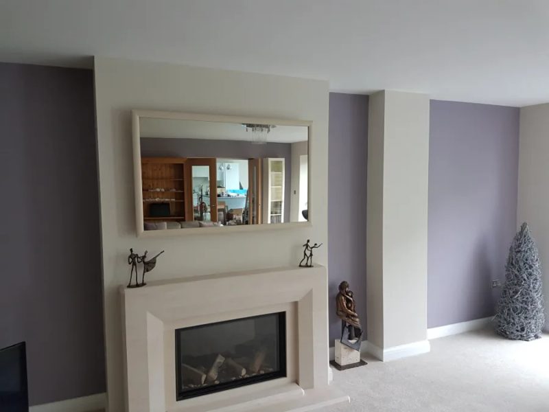 Colour-Matched Fireplace Mirror TV — above fireplace