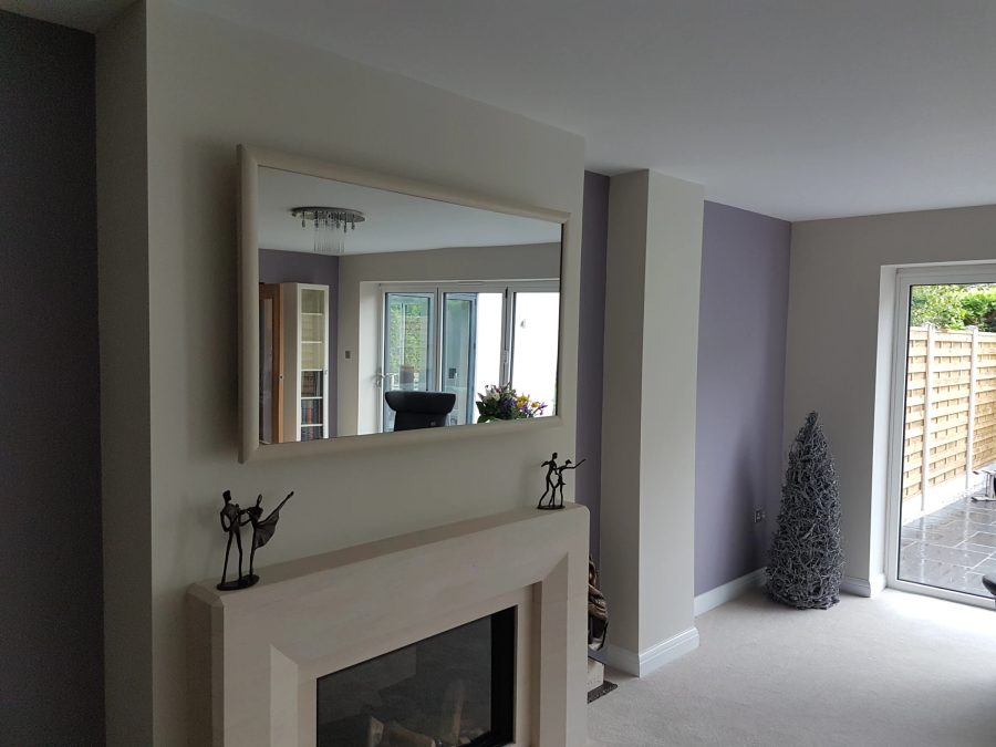 Colour-Matched Fireplace Mirror TV — above fireplace — detail photograph