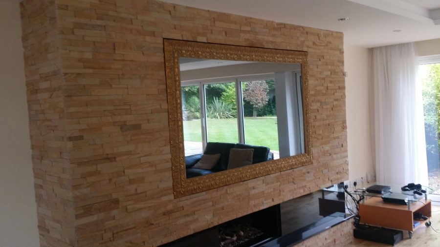 65" Stone Feature Wall Mirror TV — feature wall — detail photograph