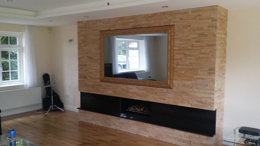 65" Stone Feature Wall Mirror TV — screen off