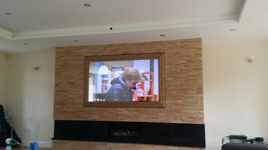 65" Stone Feature Wall Mirror TV — feature wall — detail photograph